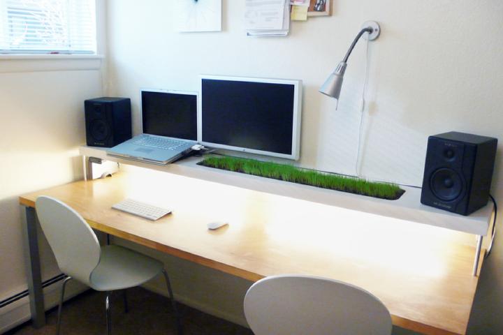 This office desk space is clean but not sterile with the clever desk planter. Photo: Nicholas Todd/Flickr
